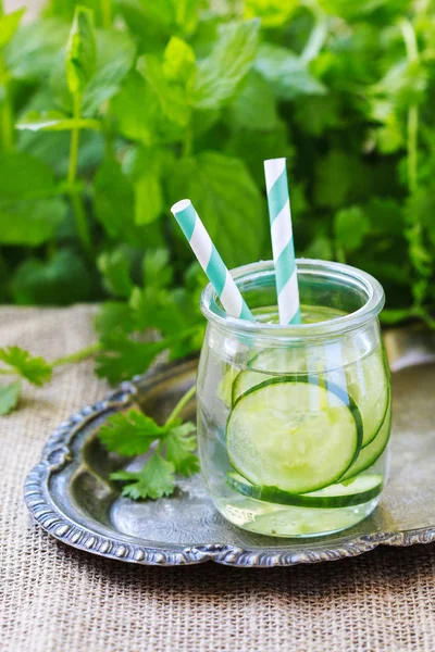 Healthy water with cucumber, zingiber and mint.