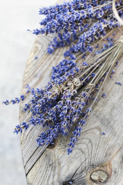 Bunch of lavender on wood — Stock Photo, Image