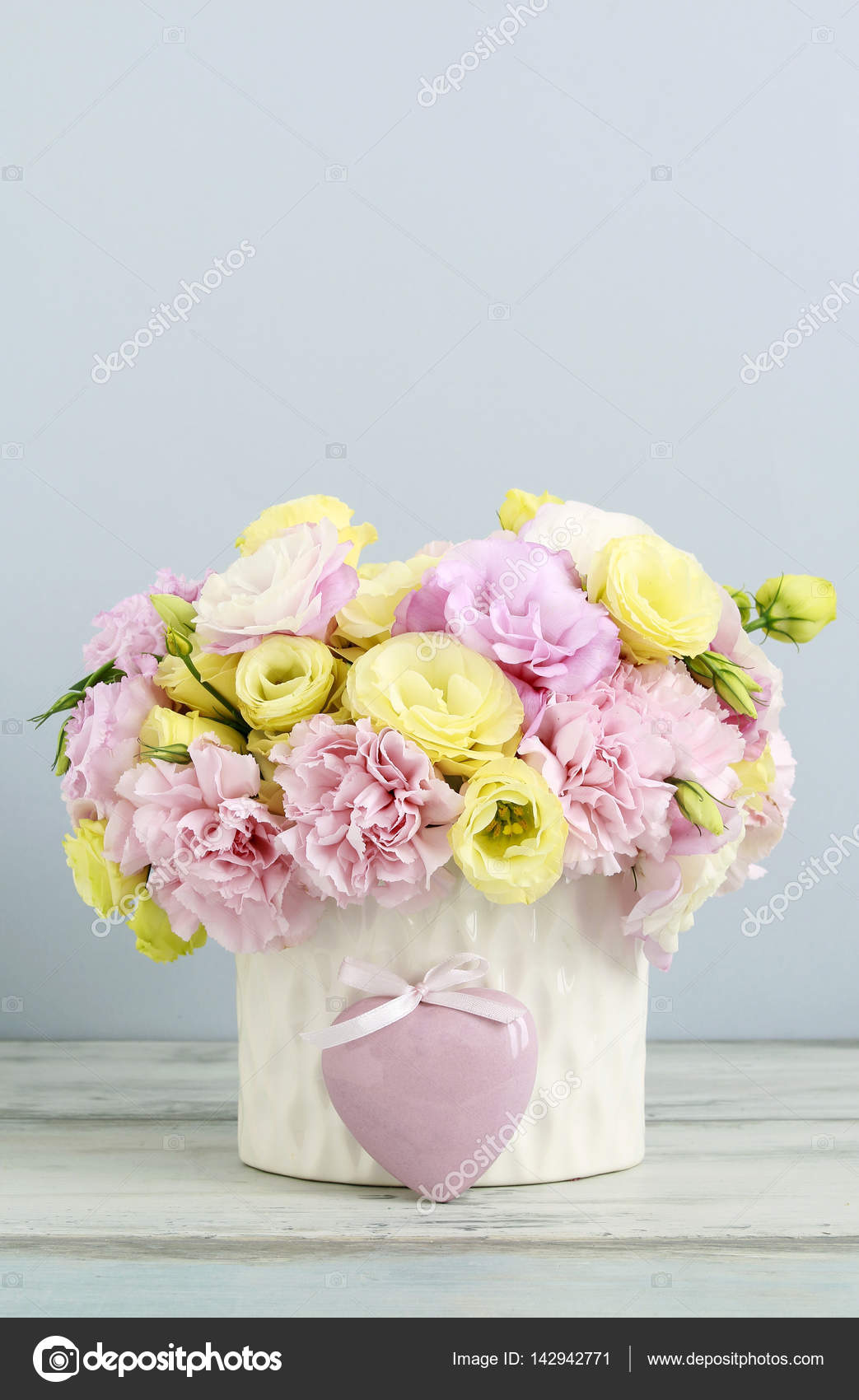 Fiori Gialli E Rosa.Floral Arrangement With Pink Carnation And Yellow Eustoma Flower
