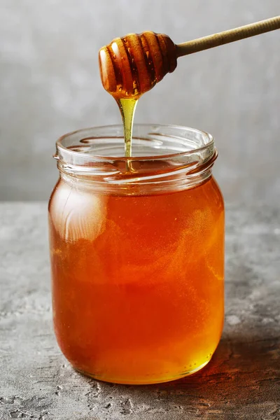 Jar of honey — Stock Photo, Image