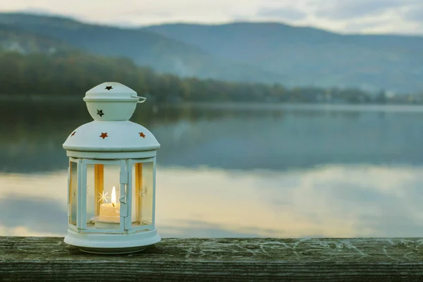 White lantern on wooden pier. — Stock Photo, Image
