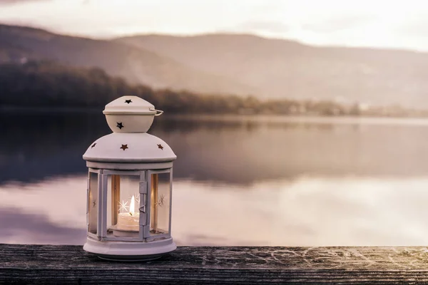 White lantern on wooden pier. — Stock Photo, Image