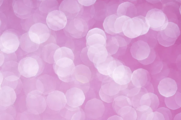 Pink glittering lights. Blurred abstract background. — Stock Photo, Image