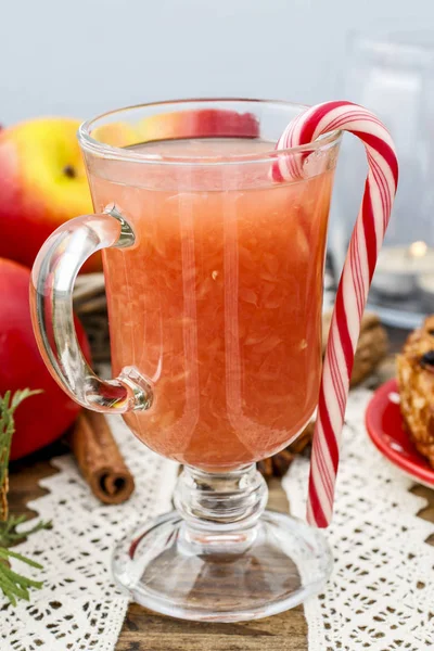 Juice from freshly squeezed fruit in tall glass.