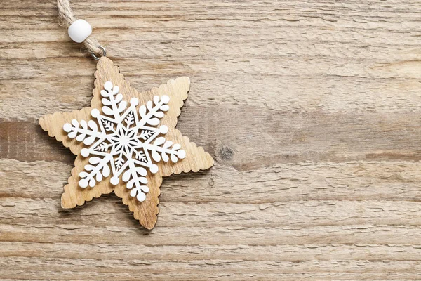 Star on wooden background — Stock Photo, Image
