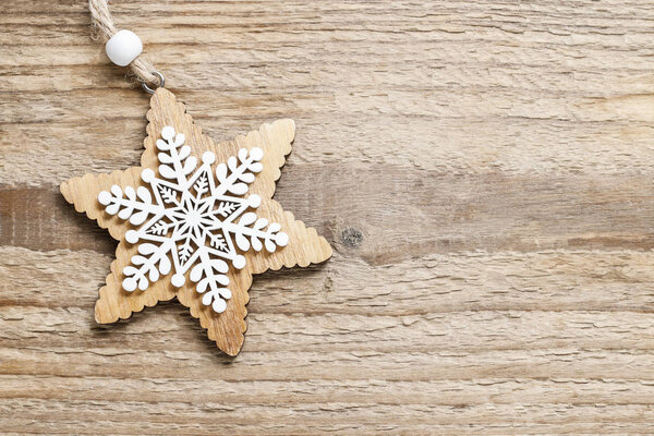 Star on wooden background