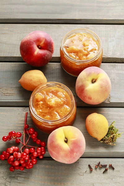 Peach jam and fruits — Stock Photo, Image
