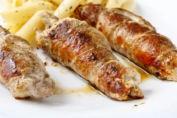 Baked pork chop with penne pasta — Stock Photo, Image