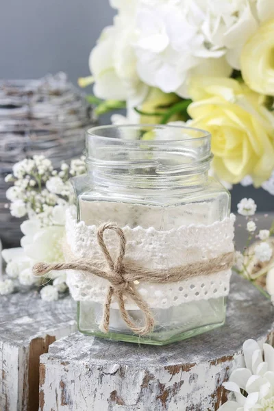 Glass jar decorated with lace and string, white pumpkins — Stock Photo, Image