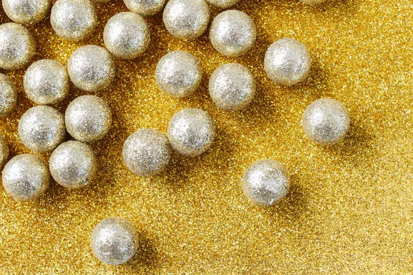 Golden balls on golden background — Stock Photo, Image