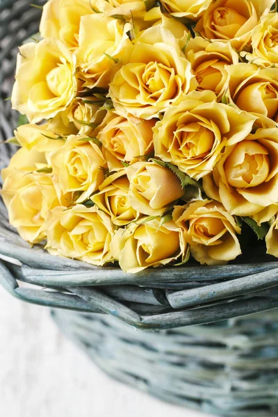 Yellow roses in the basket