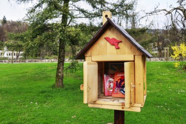 WISLA, POLAND - APRIL 16,2016: Outdoor library box made by local clipart