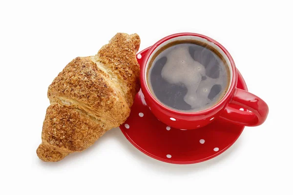 Französisches Croissant und Tasse schwarzen Kaffee — Stockfoto