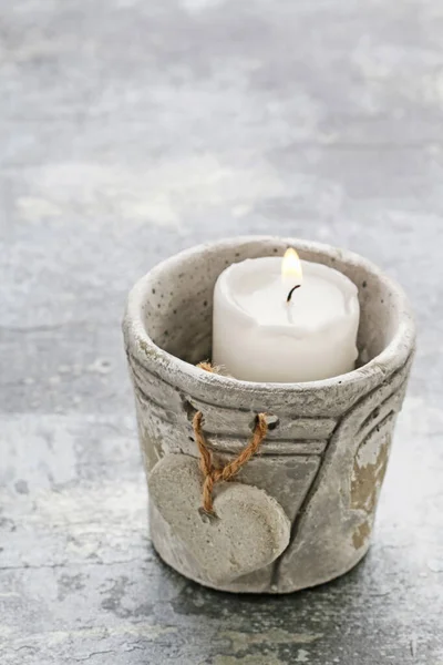 Stone candle holder with a heart — Stock Photo, Image