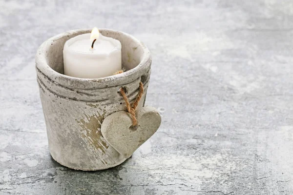Stone candle holder with a heart — Stock Photo, Image