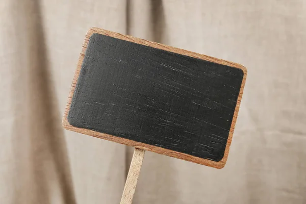 Blank blackboard label isolated on a grey background. — Stok fotoğraf