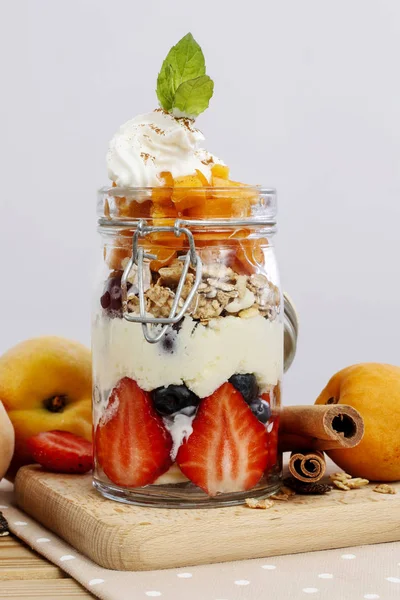 Layer fruit dessert in glass container — Stock Photo, Image