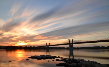 picturesque sunset, view on bridge over Vistula river nearby Kwidzyn in northern Poland clipart