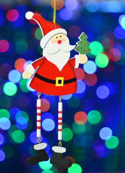 Vánoční dekorace, santa claus na bokeh barevné pozadí — Stock fotografie
