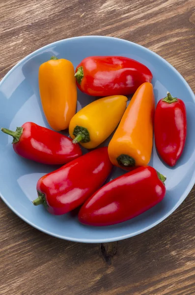 Variety of sweet pepper lying on a plate — Stock Photo, Image