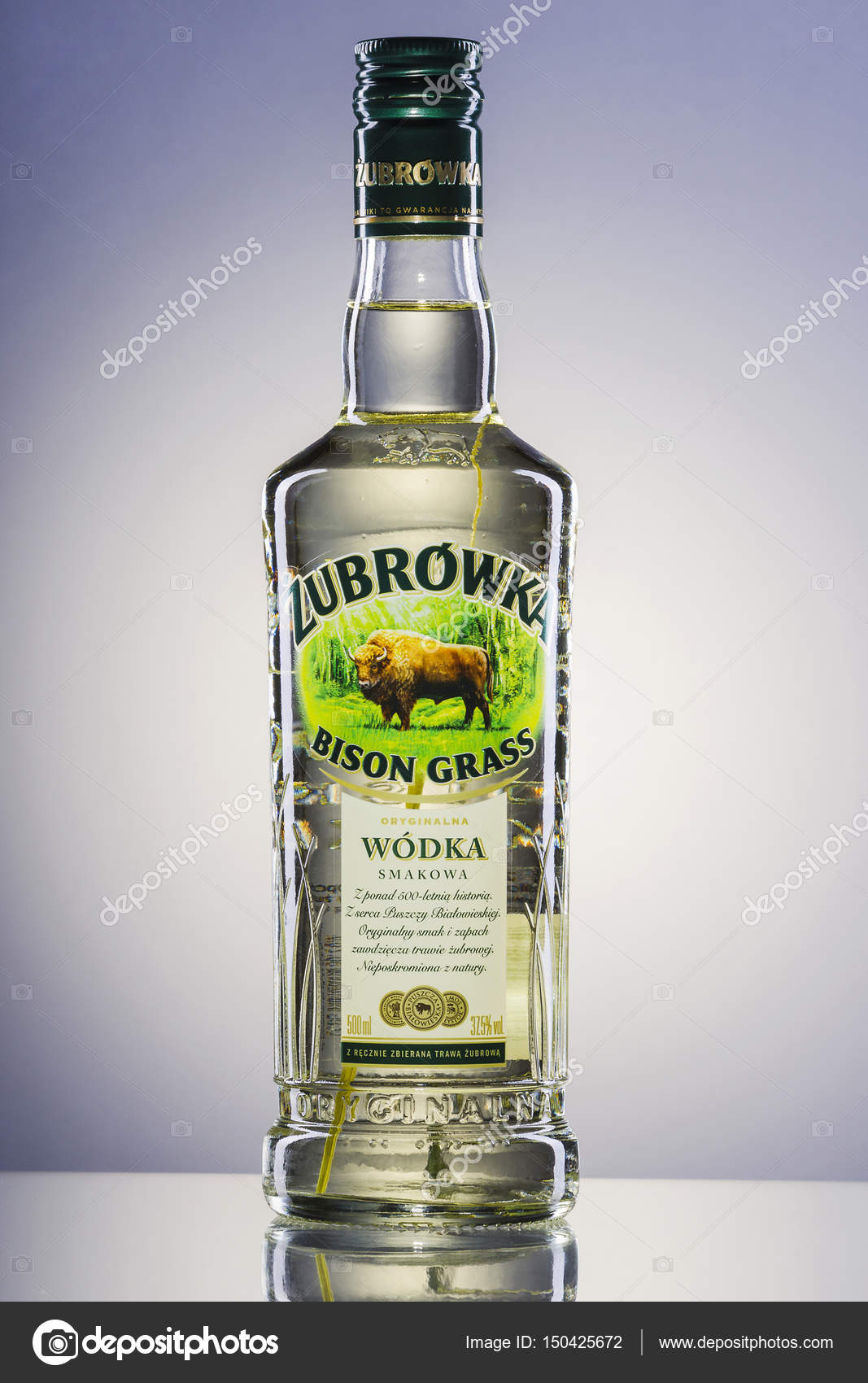 Zubrowka grass flavored vodka on Stock Editorial #150425672 DarioSz – background. © gradient Photo