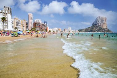 Picturesque landscape of sandy beach in Calpe, Spain clipart