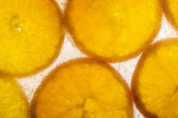 Plasterki Pomarańczy Zamrożone Lodzie — Zdjęcie stockowe
