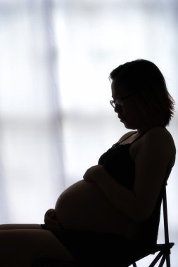 Siluet göbek Asya hamile kadın 