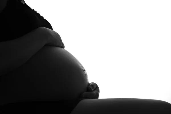 Silhouette of the belly asia pregnant woman with window light — Stock Photo, Image