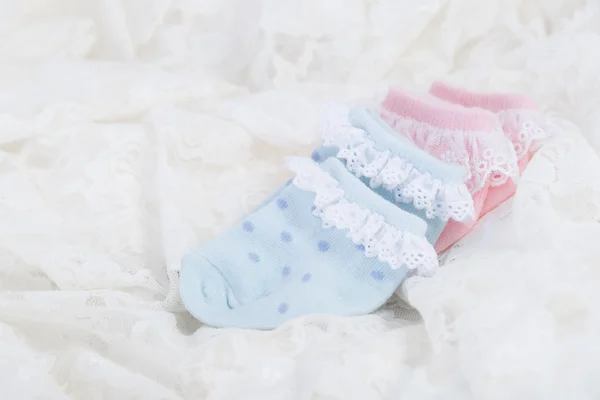 Baby socks for new born baby on Wedding lace background — ストック写真