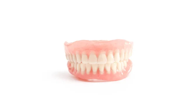 Prothèses dentaires complètes sur fond blanc — Photo