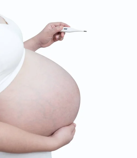 A barriga asiática mulher grávida segurando sua barriga isolada no fundo branco — Fotografia de Stock