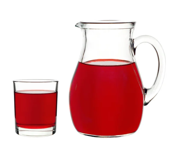 Kırmızı kuş üzümü ve içeceği olarak bir cam sürahi — Stok fotoğraf