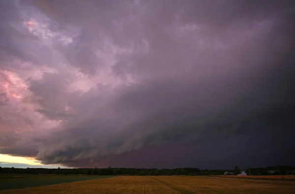 Angry shelf clouds over town