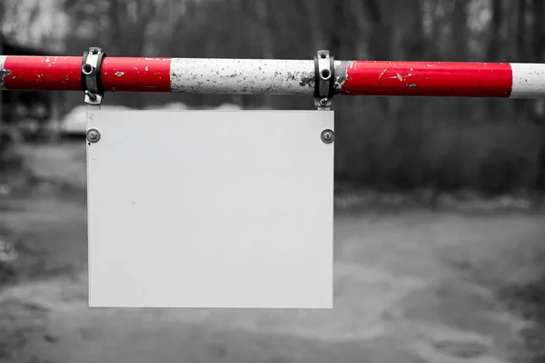 Barrier with a blank signboard — Stock Photo, Image