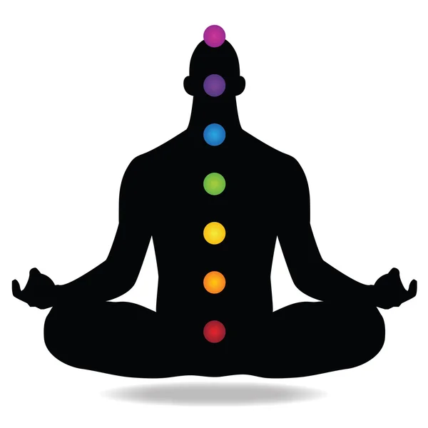 Uomo seduto con sette chakra — Foto Stock