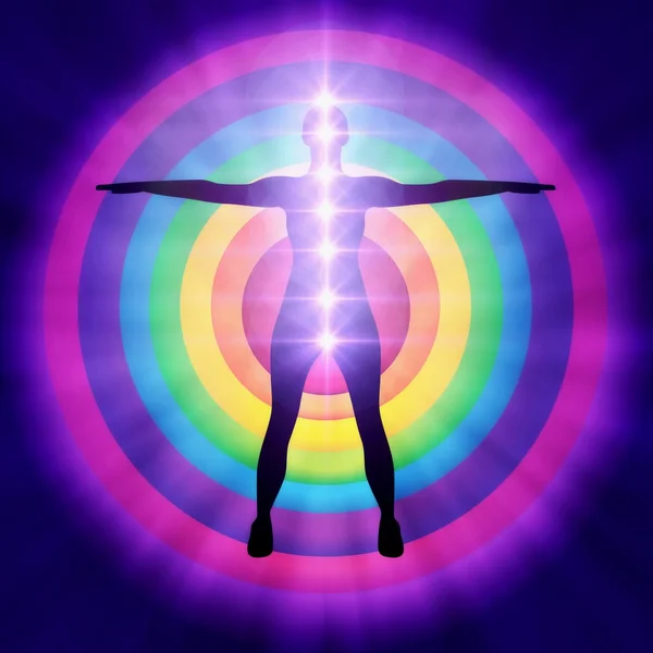 Donna che fa yoga posa con centri chakra — Foto Stock