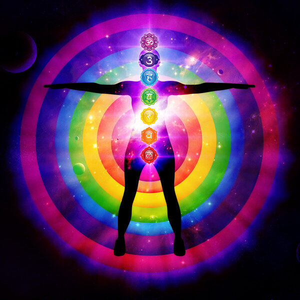 Woman Doing Yoga Pose With Chakra Centers