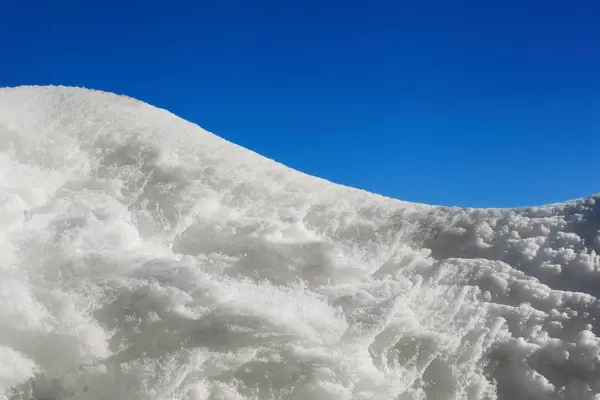 Witte sneeuw structuur met sky — Stockfoto