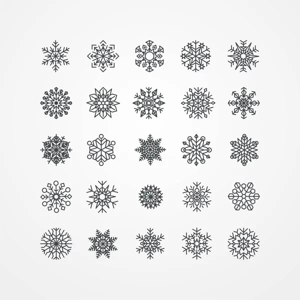 Sammlung schwarzer Schneeflocken auf weißem Hintergrund — Stockvektor