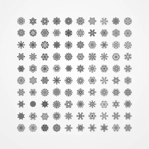 Sammlung schwarzer Schneeflocken auf weißem Hintergrund, Vektor krank — Stockvektor