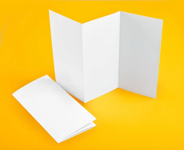 Blank white folding paper flyer — Stock Photo, Image