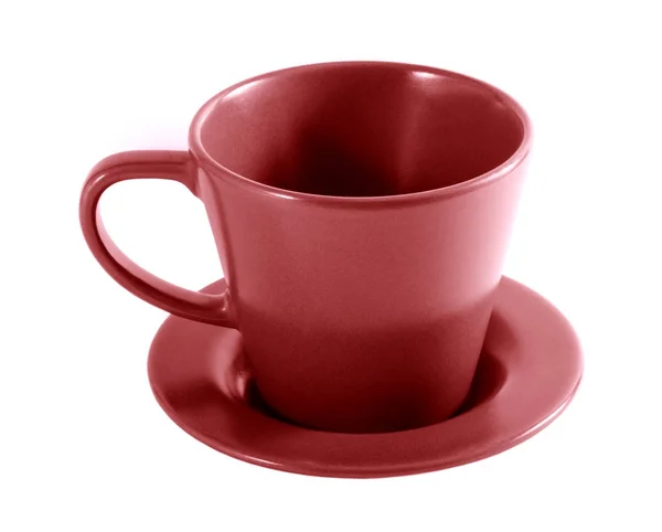 Vide tasse de café rouge et soucoupe sur un fond blanc — Photo