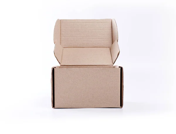 Opened cardboard box for packaging on a white background. — Stock Photo, Image