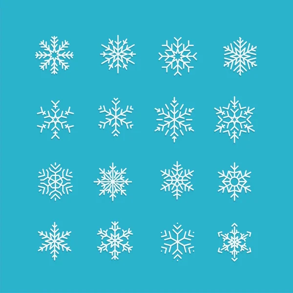 Weiße Schneeflocken Symbol auf blauem Hintergrund — Stockvektor