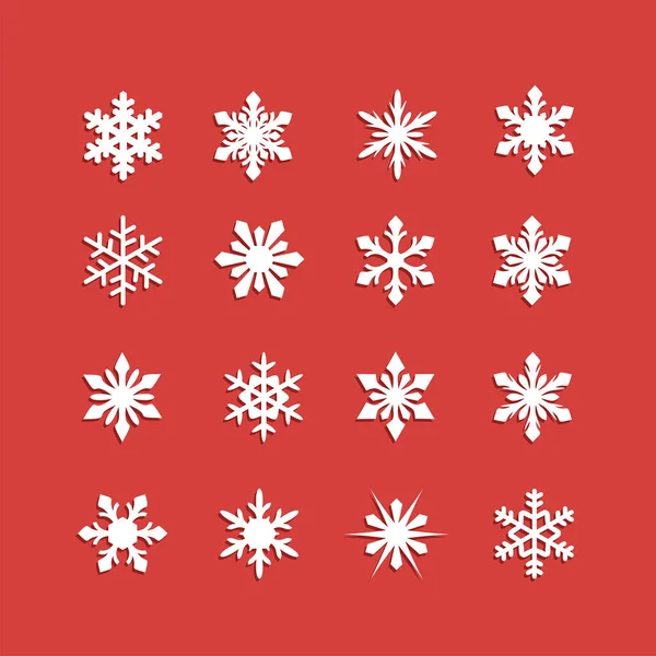 赤の背景に白い雪の結晶アイコン. — ストックベクタ