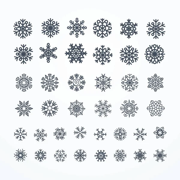 Чорні сніжинки значок на білому тлі . — стоковий вектор