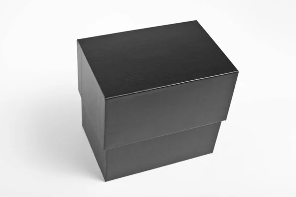 Caja negra sobre fondo blanco . — Foto de Stock