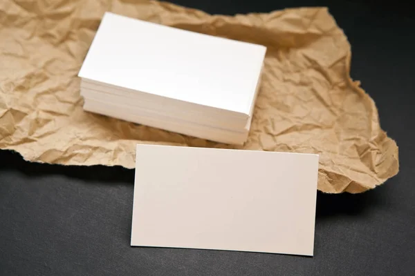 Blank business cards on a grey background — Stock Photo, Image