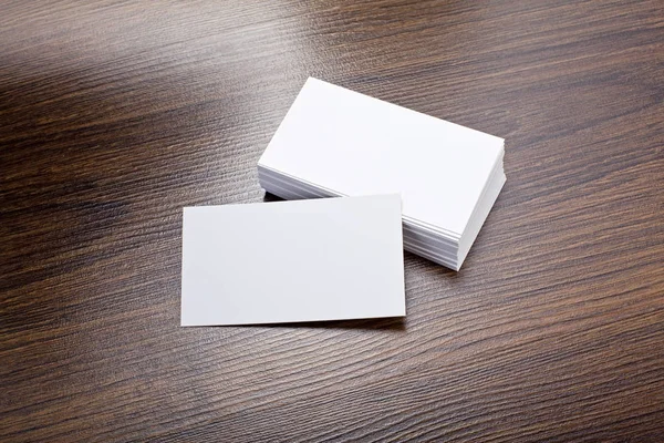 Mockup of white business cards at wooden background — Stock Photo, Image
